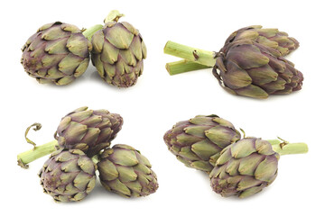 Fototapeta premium whole artichokes with a stem on a white background
