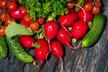 fresh seasonal vegetables on wooden background, top view