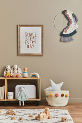 Stylish scandinavian newborn baby room with brown wooden mock up poster frame, toys, plush animal...