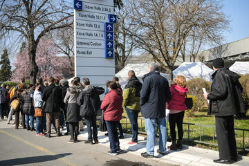 Mass vaccination. People from neighboring countries stand in long queues on Belgrade fair in front...