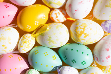 colorful painted easter eggs on yellow background festive easter card