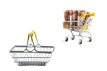 Money inside a yellow shopping cart on a white background. Isolated.