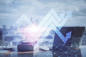 Double exposure of arrows drawing and desk with open notebook background. Concept of growth