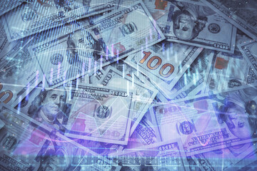 Multi exposure of forex chart drawing over us dollars bill background. Concept of financial success markets.