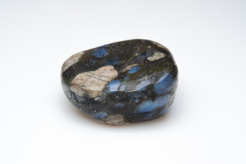 Natural gemstone liberite on white background