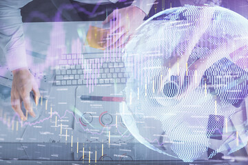 Double exposure of man and woman working together and financial chart hologram drawing. market analysis concept. Computer background. Top View.