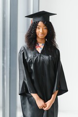 Excited African American woman at her graduation.