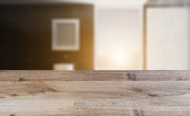 Freestanding bath with towels in grey modern bathroom. 3D rendering.. Abstract blur phototography. wooden table on blurred background.