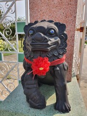 Stone lion in front of chinese temple The animal is used as a means of protecting the site as well...