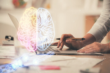 Double exposure of woman hands working on computer and brain hologram drawing. Ai concept.