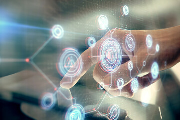Multi exposure of man's hand holding and using a digital device and data theme drawing. Innovation concept.