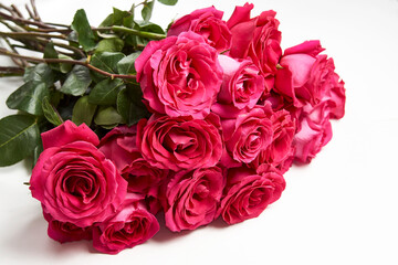 Bouquet of pink roses on white background with copy space