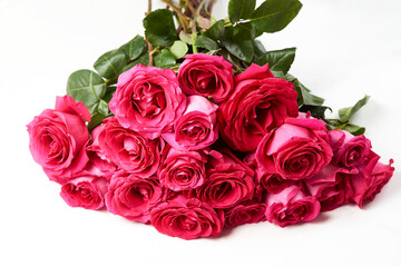 Bouquet of pink roses on white background with copy space