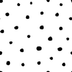 Abstract dots monochrome seamless pattern. Hand drawn Polka dot grunge brush black and white ornament.