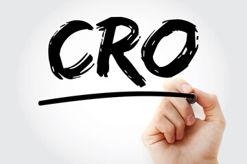 CRO - Conversion Rate Optimization acronym with marker, business concept background