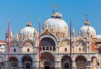 Fototapeta na wymiar Venice. Domes of St. Mark's Cathedral at sunrise.