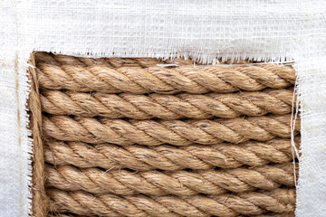 Fototapeta na wymiar Close-up of a rope made of natural coarse sisal fiber