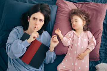 Mother Asking for Silence while Baby Sleeps