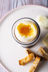 healthy snack: crumpled egg with croutons top view
