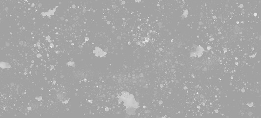 Gray discreet background with small specks and blots. Abstract background with space for text.