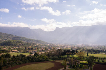 View of the Valley of Soller with sun rays during the morning. Palma de Mallorca