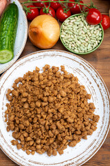 Vegetarian minced meat imitation made from grains, soybeans, vegetables and legumes