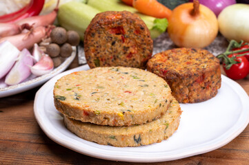 Round vegetarian patties or burgers made from grains, vegetables and legumes