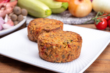Round vegetarian patties or burgers made from grains, vegetables and legumes