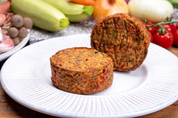 Round vegetarian patties or burgers made from grains, vegetables and legumes
