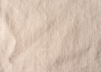 Beige napkin cloth texture. Linen fabric surface tablecloth background.