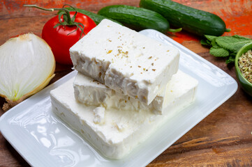 Cheese collection, white Greek salty feta cheese ready to eat