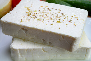 Cheese collection, white Greek salty feta cheese ready to eat