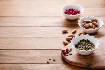 Healthy snacks. Variety of superfood: nuts, berries, grain, seed