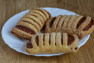 Tasty cookies with apple jam closeup.