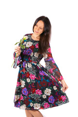 Attractive woman with flowers on a white background