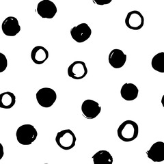 Hand drawn seamless vector pattern with abstract black circles. Trendy vector background for prints, textile and wallpaper. Modern backdrop in grunge style in black and white