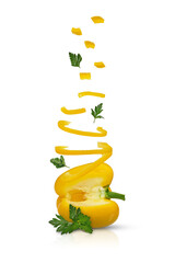Naklejka na ściany i meble levitating slices of yellow pepper and parsley leaves on a white background