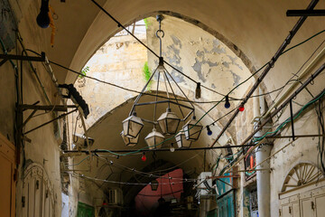 Deserted Daniel Street Arab market on a rainy day near the Yafo Gate in the old city of Jerusalem,...