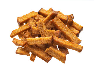 Pile of rye bread croutons, salted bread sticks isolated on white background