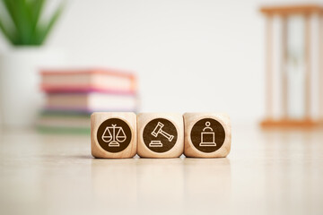 Concept of court, justice and lawyer icons on wooden cubes