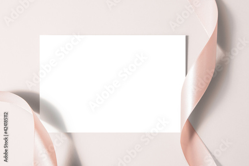 Blank white -colored and ribbons, mock up for romantic invitations, greeting card, mother's day card, wedding card.