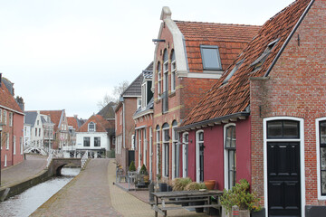 City view with water channel among houses.