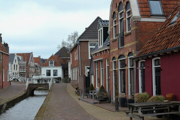 City view with water channel among houses.