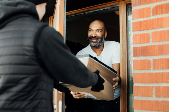 Man having parcels delivered