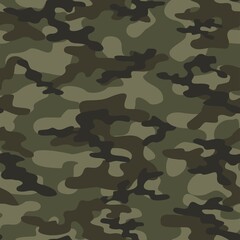 Fototapeta premium camouflage texture with black spots seamless green pattern. Vector trendy design.