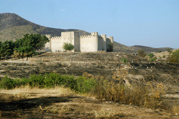 Fototapeta premium Deserted landscape with bombed houses in Nagorno Karabakh after war