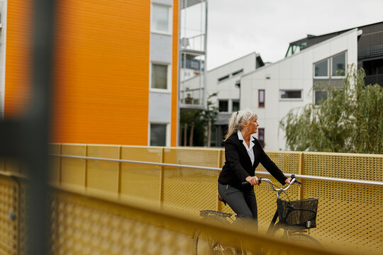 Senior woman cycling