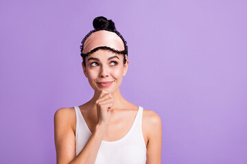 Photo of happy positive lovely dreamy woman look copyspace thinking hold finger chin isolated on violet color background