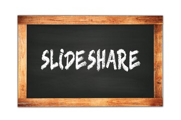 Fototapeta premium SLIDESHARE text written on wooden frame school blackboard.