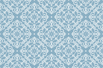 Floral pattern. Vintage wallpaper in the Baroque style. Seamless vector background. White and blue ornament for fabric, wallpaper, packaging. Ornate Damask flower ornament